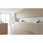 A modern kitchen features a single, lighter-toned cabinet door newly installed next to older, darker cabinet fronts, clearly illustrating the issue of mismatched kitchen cabinets often resulting from an incomplete 'spot repair' for water damage. This visual directly supports the article 'Matching Kitchen Cabinets: Fighting the ‘Spot Repair’'.