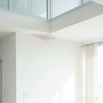 Close-up of severe water damage and staining on a condo ceiling, indicating a leak from an upstairs unit. This 'walls-in' damage exemplifies scenarios where 24/7 Restoration Specialists provide expert mitigation and support condo owners in navigating subrogation for deductible recovery.