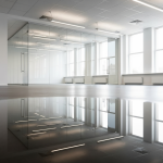 A professional office space undergoing a build-out, with visible water damage on the floor and a bucket catching drips, indicating an unfortunate event like an office flood. This scene emphasizes the critical question of who insures these commercial betterments and improvements, whether it's the tenant or landlord.