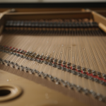 Grand piano soundboard water damage crack