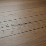 Hardwood floor checking water damage drying