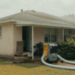 Ranch house with a dehumidifier at the front door